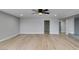 Large living room with wood-look floors, recessed lighting, and a ceiling fan at 1013 Cunningham Dr, Las Vegas, NV 89106