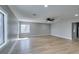 Bright living room featuring new floors, a ceiling fan, and lots of natural light at 1013 Cunningham Dr, Las Vegas, NV 89106