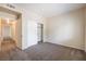 Carpeted bedroom with a large closet, sliding doors, light walls, and a light-colored carpet at 1050 E Cactus Ave # 1128, Las Vegas, NV 89183