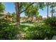 Lush greenery and manicured grounds create a serene backdrop for this well-maintained residential complex at 1050 E Cactus Ave # 1128, Las Vegas, NV 89183