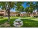 Lush green space with picnic tables provides a peaceful and inviting common area for residents to enjoy at 1050 E Cactus Ave # 1128, Las Vegas, NV 89183