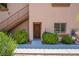 Charming condo entrance with well-kept landscaping and private stairway at 1050 E Cactus Ave # 1128, Las Vegas, NV 89183
