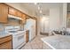 Efficient kitchen featuring ample cabinets and white appliances at 1050 E Cactus Ave # 1128, Las Vegas, NV 89183