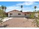 Spacious backyard featuring gravel landscaping and mature landscaping at 1158 E Hacienda Ave, Las Vegas, NV 89119