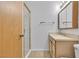 Bathroom featuring glass shower and vanity with sink at 1158 E Hacienda Ave, Las Vegas, NV 89119