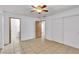 Spacious bedroom featuring tiled floors, ceiling fan, and closet at 1158 E Hacienda Ave, Las Vegas, NV 89119