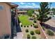 Large landscaped backyard featuring a charming garden, patio and lush green lawn at 1182 Thomas Bay Cir, Logandale, NV 89021