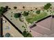 Mature desert landscaping, fire pit, and winding gravel paths surrounding the home at 1182 Thomas Bay Cir, Logandale, NV 89021