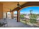 Spacious balcony has arches, ceiling fans and views of the neighborhood at 1182 Thomas Bay Cir, Logandale, NV 89021