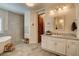 Elegant bathroom with a freestanding tub, walk-in shower, and marble tile accents at 1182 Thomas Bay Cir, Logandale, NV 89021