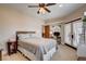 Bedroom with ceiling fan, work space, and french doors to the outside at 1182 Thomas Bay Cir, Logandale, NV 89021