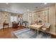 Large bonus room features wood floors, shelving, and plenty of space at 1182 Thomas Bay Cir, Logandale, NV 89021