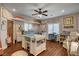 Large bonus room features a ceiling fan, wood floors, and lots of light at 1182 Thomas Bay Cir, Logandale, NV 89021