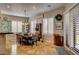 Bright dining area with large windows and a view of the outdoor patio at 1182 Thomas Bay Cir, Logandale, NV 89021