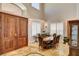 Elegant dining room with a high ceiling and windows at 1182 Thomas Bay Cir, Logandale, NV 89021
