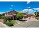 Elegant home with well-kept landscaping, mature trees, and a circular driveway at 1182 Thomas Bay Cir, Logandale, NV 89021
