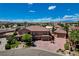 Beautiful home with a long driveway, mature trees and shrubbery, and an attached three-car garage at 1182 Thomas Bay Cir, Logandale, NV 89021