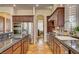 The kitchen features stainless steel appliances, custom cabinets, and granite countertops at 1182 Thomas Bay Cir, Logandale, NV 89021