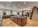 Expansive kitchen with a large island, granite countertops, and tile flooring at 1182 Thomas Bay Cir, Logandale, NV 89021