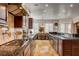Modern kitchen with stainless steel appliances, custom cabinets, and ample counter space at 1182 Thomas Bay Cir, Logandale, NV 89021