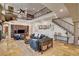 Bright, open-concept living room with a staircase and plenty of natural light at 1182 Thomas Bay Cir, Logandale, NV 89021