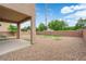 Low maintenance backyard with gravel and block wall at 125 Sharp Edge Ave, North Las Vegas, NV 89031