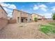 View of the home's backyard showing the patio and block wall at 125 Sharp Edge Ave, North Las Vegas, NV 89031