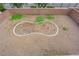 Bird's eye view of a backyard featuring a pebble groundcover and potential for a garden area at 125 Sharp Edge Ave, North Las Vegas, NV 89031