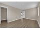 This spacious bedroom boasts wood-look floors and a large walk-in closet at 125 Sharp Edge Ave, North Las Vegas, NV 89031