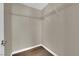 Walk-in closet features built-in shelving for optimal storage at 125 Sharp Edge Ave, North Las Vegas, NV 89031