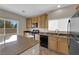 Well-equipped kitchen with granite countertops and stainless-steel appliances at 125 Sharp Edge Ave, North Las Vegas, NV 89031