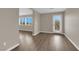 View of luxury vinyl plank flooring, neutral colored walls, and a back door at 125 Sharp Edge Ave, North Las Vegas, NV 89031