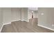 Living room showcasing neutral colored walls and luxury vinyl plank flooring at 125 Sharp Edge Ave, North Las Vegas, NV 89031