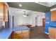Open concept living, features a dining area with wood floors, and view of the front entry at 1520 Della Ct, Boulder City, NV 89005