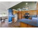 Well-equipped kitchen features wood cabinets, modern appliances, and ample counter space at 1520 Della Ct, Boulder City, NV 89005