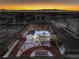 Aerial view of property showcasing house, landscaped yard, surrounding neighborhood, and mountain views at 1731 Sherwin Ln, Las Vegas, NV 89156