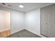 A small carpeted bedroom featuring neutral paint, a closet, and an entry doorway at 1731 Sherwin Ln, Las Vegas, NV 89156