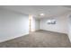 A carpeted bedroom featuring neutral paint, a closet, and a window at 1731 Sherwin Ln, Las Vegas, NV 89156