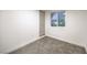 A carpeted bedroom featuring neutral paint, a closet, and a single window at 1731 Sherwin Ln, Las Vegas, NV 89156