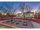Charming home featuring xeriscaped yard with native plants and decorative rock at 1731 Sherwin Ln, Las Vegas, NV 89156