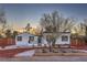 Charming home with a xeriscaped front yard and attractive desert landscaping at 1731 Sherwin Ln, Las Vegas, NV 89156