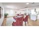 Bright living room features a gray sofa, two arm chairs, and an open layout at 1731 Sherwin Ln, Las Vegas, NV 89156