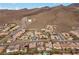 Scenic aerial shot of neighborhood homes nestled against a desert mountain backdrop at 2151 Bannerwood St, Henderson, NV 89044