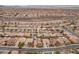 Vast aerial shot of a densely populated suburban neighborhood with a road running through at 2151 Bannerwood St, Henderson, NV 89044