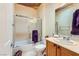 Functional bathroom with a shower-tub combination, vanity, and ample lighting for everyday use at 2151 Bannerwood St, Henderson, NV 89044