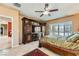 Comfortable bedroom with an entertainment center and window views, providing a relaxing retreat at 2151 Bannerwood St, Henderson, NV 89044