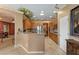 Stylish kitchen with tile flooring, granite countertops, stainless steel appliances, and custom ceiling at 2151 Bannerwood St, Henderson, NV 89044