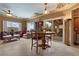 Comfortable living room with ample seating, natural light, and patio access at 2151 Bannerwood St, Henderson, NV 89044