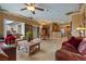 Open living space with a view of the kitchen, dining area, and outdoor patio at 2151 Bannerwood St, Henderson, NV 89044