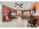 Expansive living room with tile flooring, custom painted ceiling, and ample seating at 2151 Bannerwood St, Henderson, NV 89044